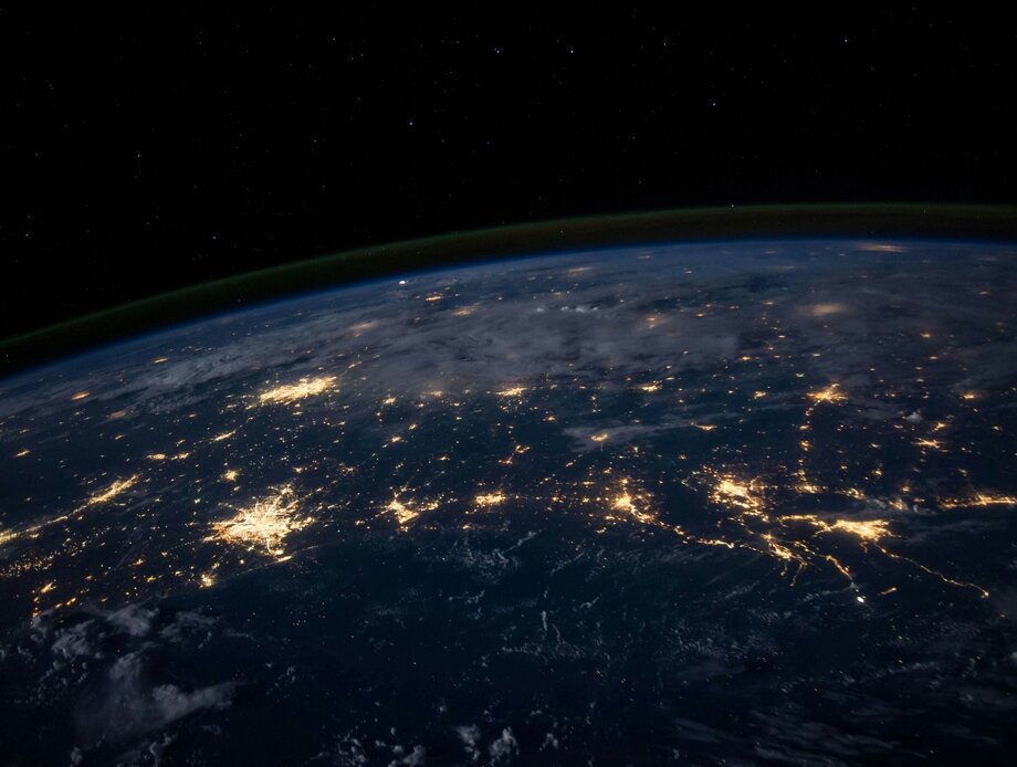 Lit up world at night showing global connections from space